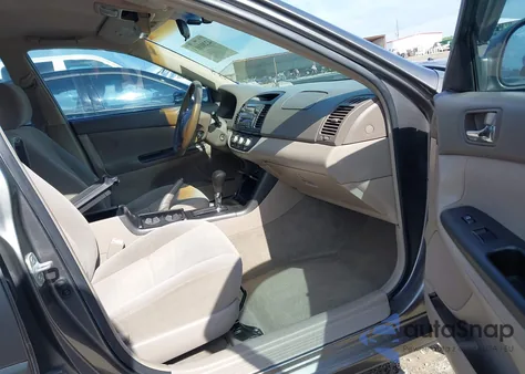 2006 Toyota Camry Le z USA, uszkodzony, nr VIN 4T1BE32KX6U698737